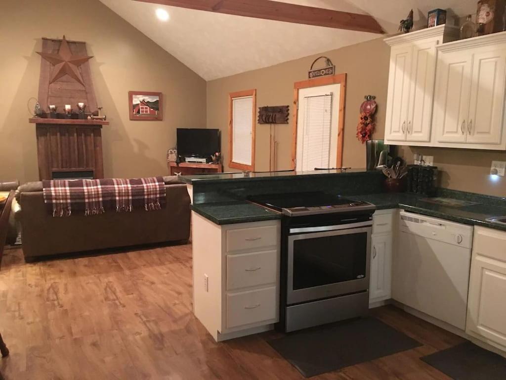 Gas Fireplace, Firepit, And Cedar Adirondack Chair Spencer Εξωτερικό φωτογραφία